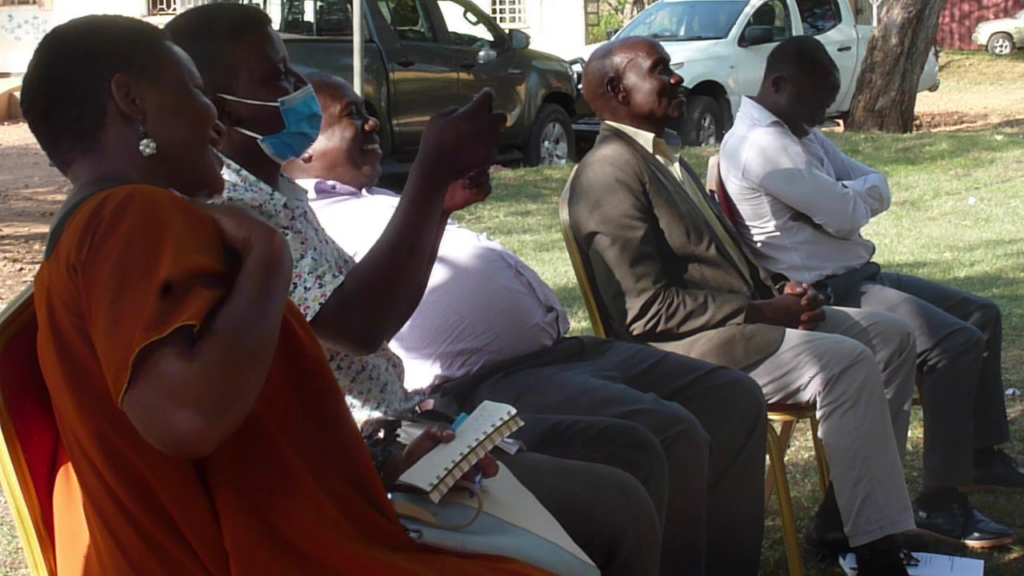 THE OUTGOING KASESE CAO BYAMUNGU ELIAS HANDED OVER OFFICE INSTRUMENTS TO THE NEW CAO PAUL WALAKIRA